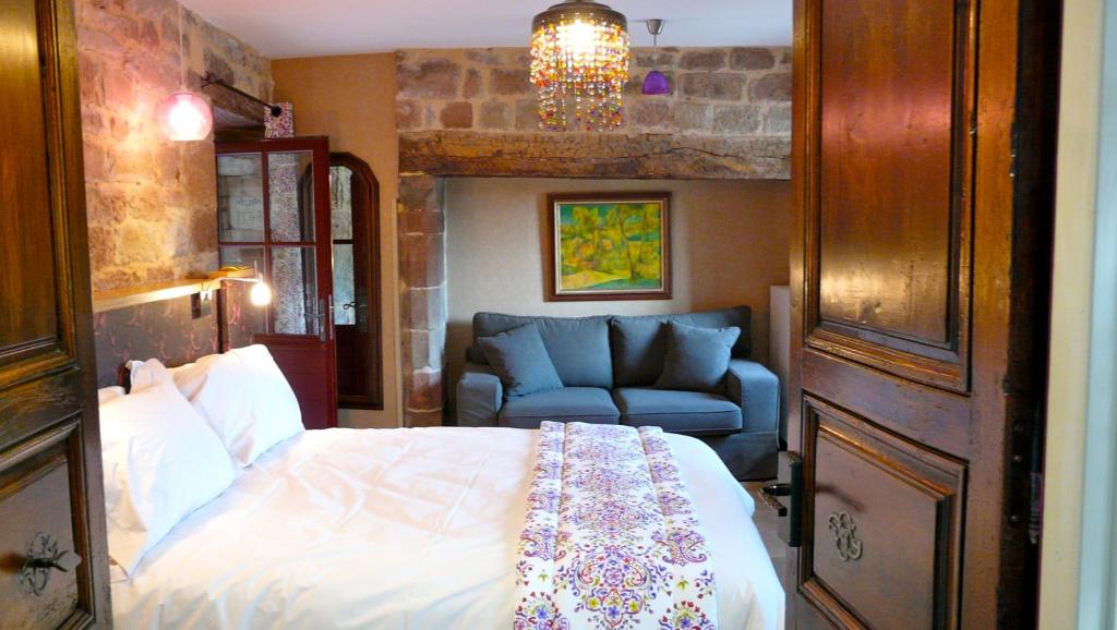 Postelja oz. postelje v sobi nastanitve La Bastidie