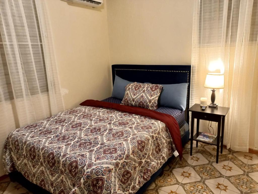 Postel nebo postele na pokoji v ubytování More Than Beauty Properties