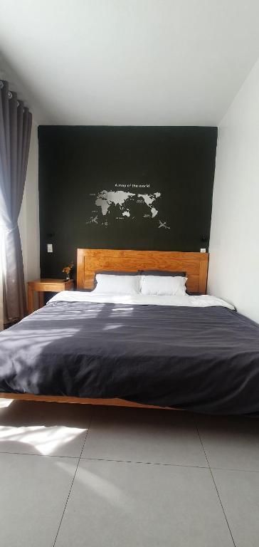 Postel nebo postele na pokoji v ubytování Hello Dalat Hostel