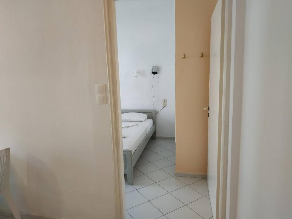 Posteľ alebo postele v izbe v ubytovaní Small Apartment For 3 Pers 70meters From The Beach