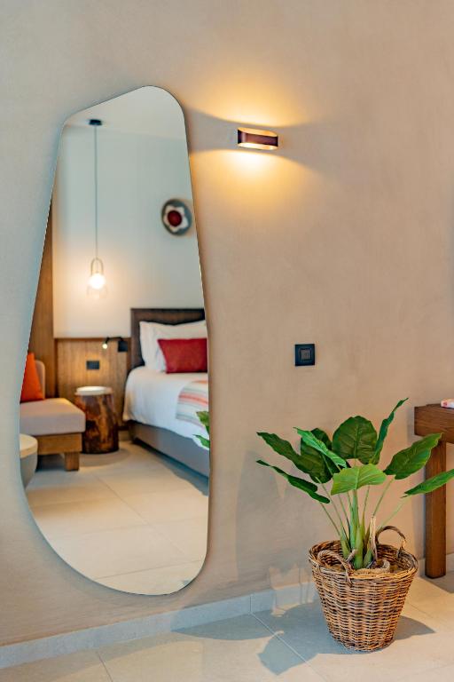 Postel nebo postele na pokoji v ubytování Minos Ambassador Suites & Spa - Adults only