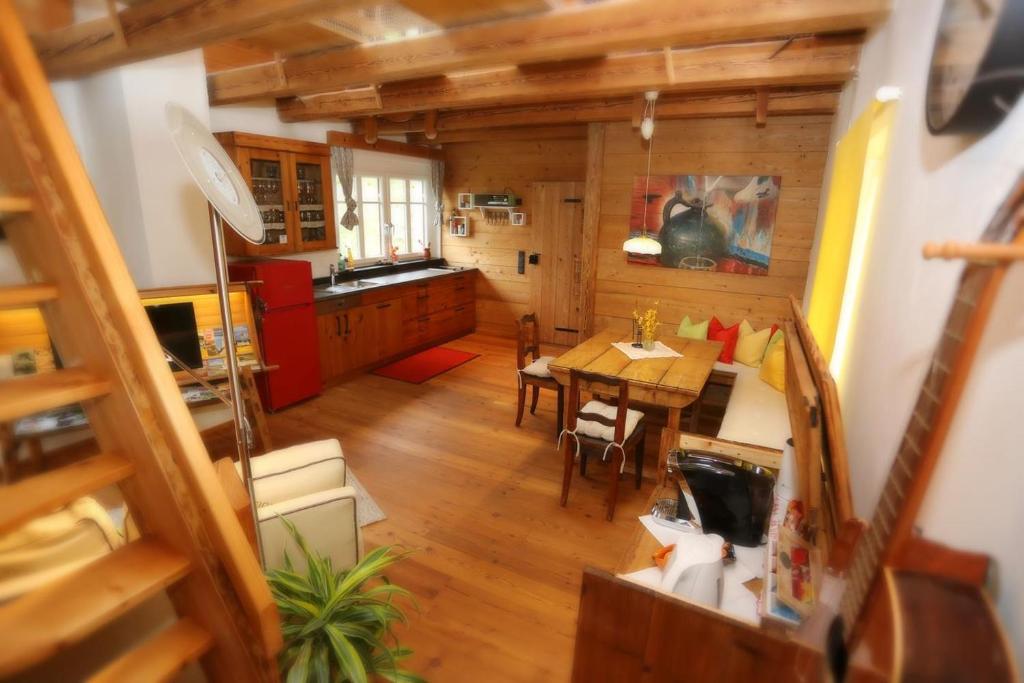 an overhead view of a kitchen and dining room at LACHGUT in Thalling