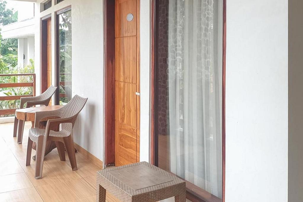 Balkón nebo terasa v ubytování Defada Village Bromo at Desa Wisata Bromo Mitra RedDoorz