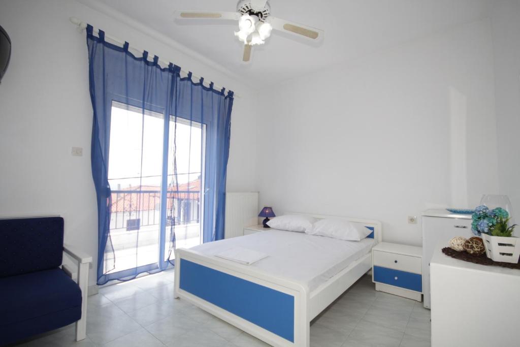 Postel nebo postele na pokoji v ubytování Hotel Elena