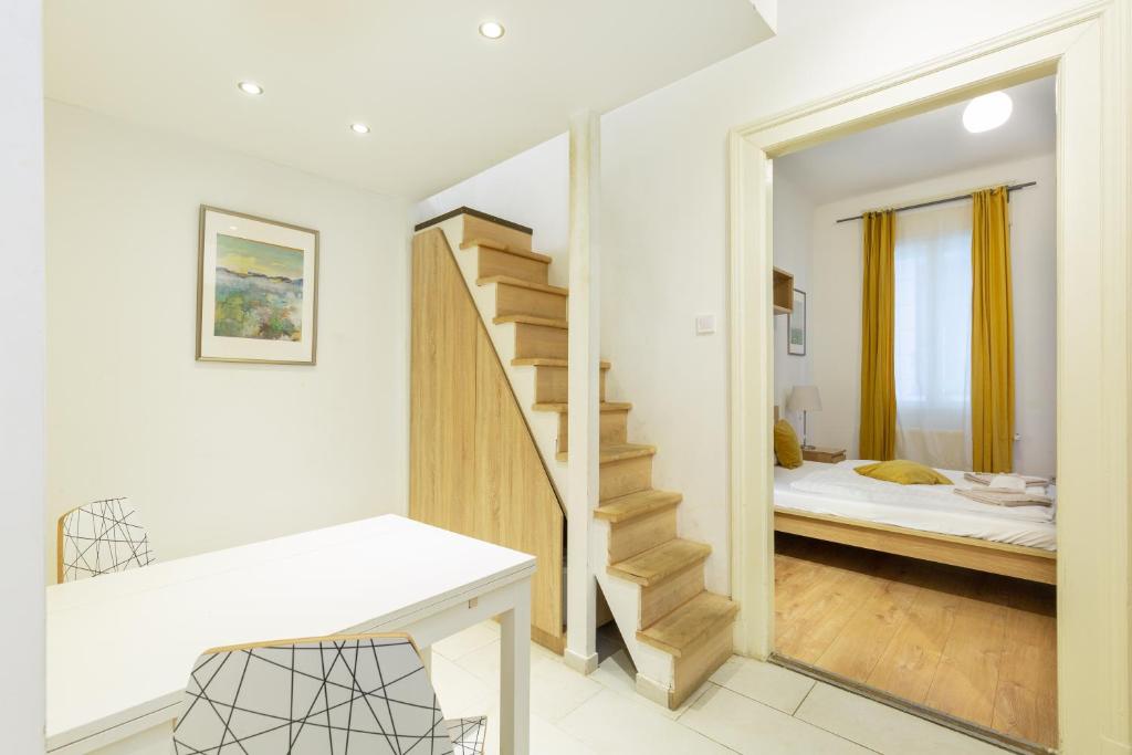 Posteľ alebo postele v izbe v ubytovaní A4-6 Aulich Apartment