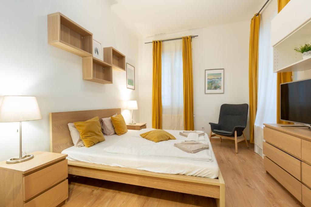 Posteľ alebo postele v izbe v ubytovaní A4-6 Aulich Apartment