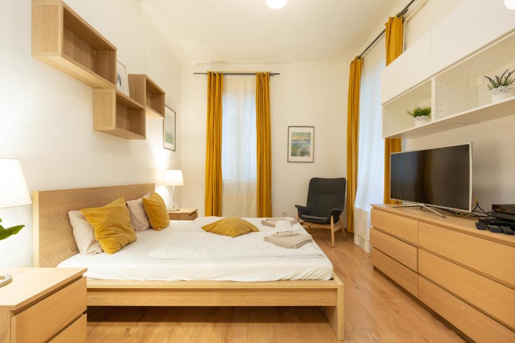 Posteľ alebo postele v izbe v ubytovaní A4-6 Aulich Apartment
