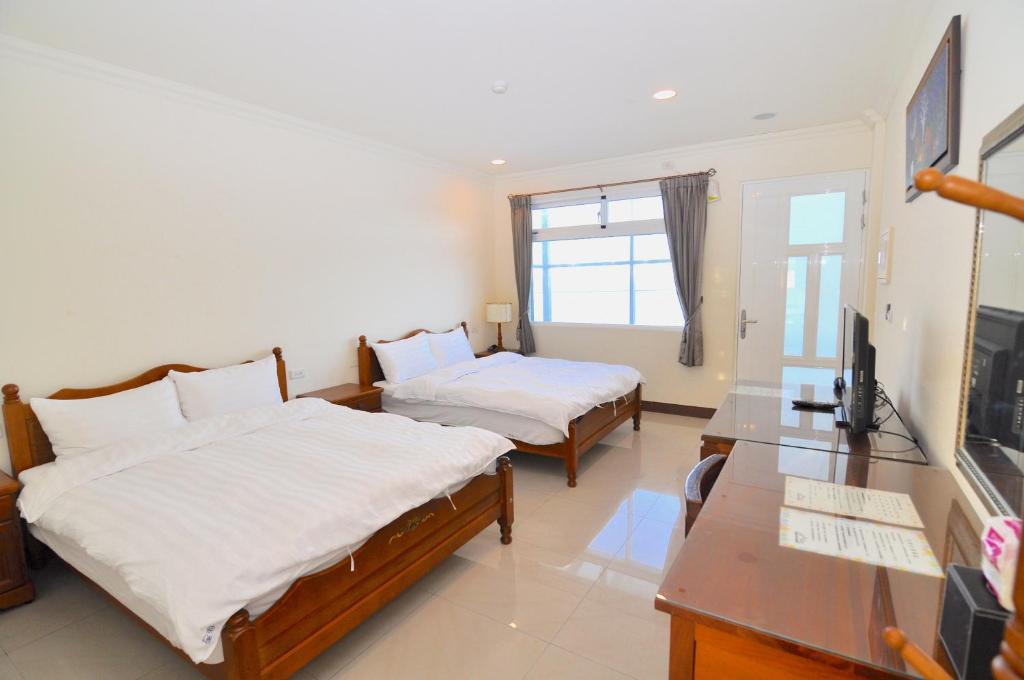 TV a/nebo společenská místnost v ubytování Xinghai Seaview Guesthouse