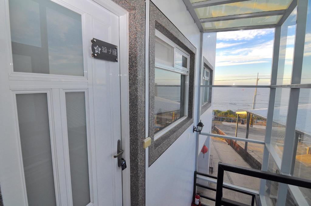 Balkón nebo terasa v ubytování Xinghai Seaview Guesthouse