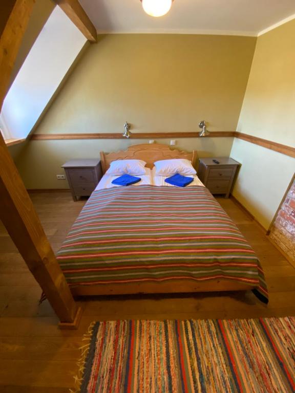 Voodi või voodid majutusasutuse Sepikoja Guest House toas