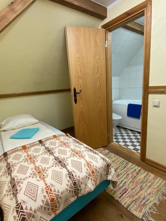 Voodi või voodid majutusasutuse Sepikoja Guest House toas