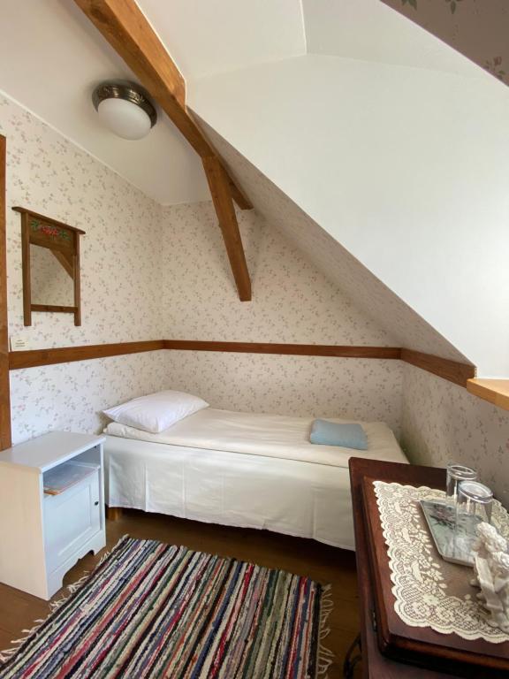 Voodi või voodid majutusasutuse Sepikoja Guest House toas