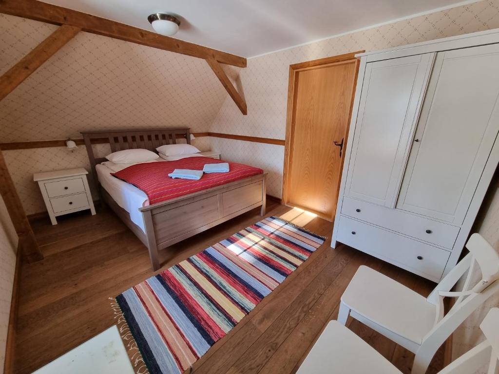 Voodi või voodid majutusasutuse Sepikoja Guest House toas