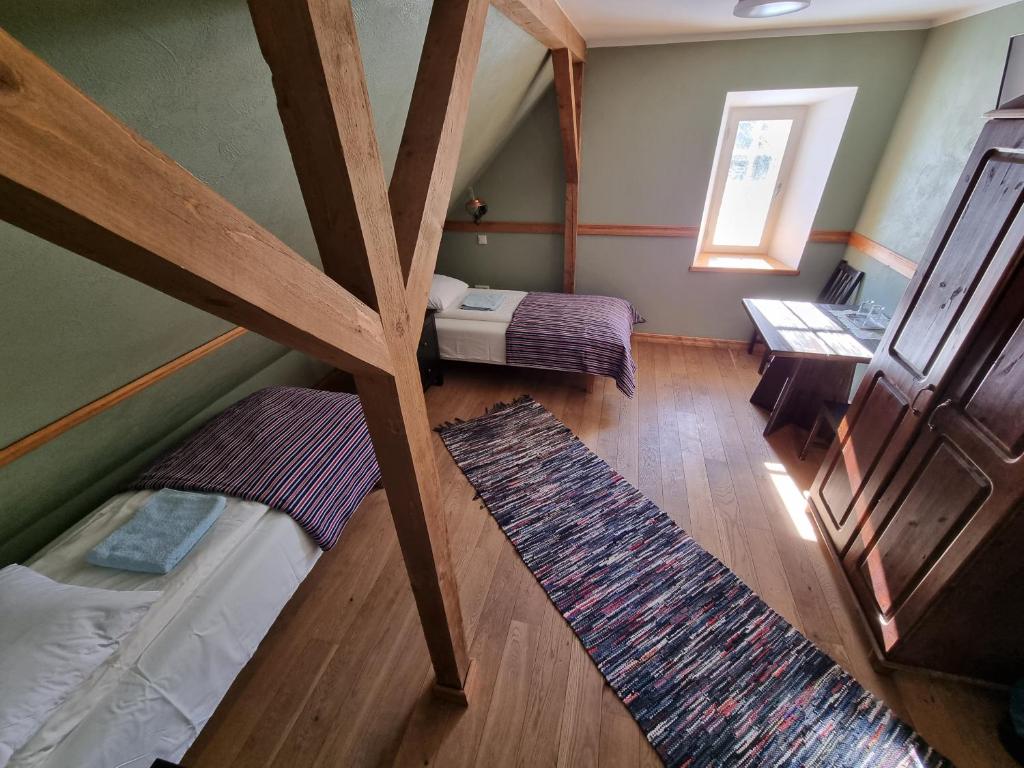 Voodi või voodid majutusasutuse Sepikoja Guest House toas