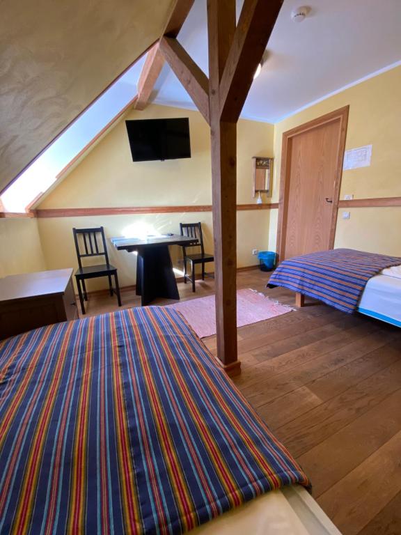 Voodi või voodid majutusasutuse Sepikoja Guest House toas