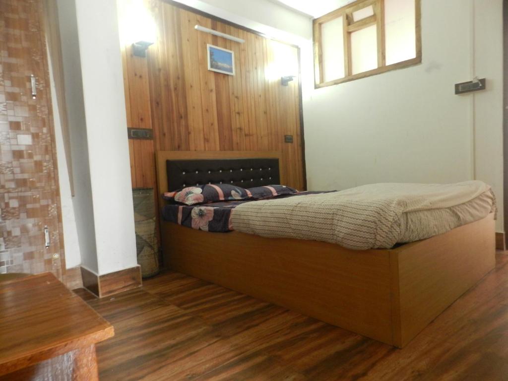 Postel nebo postele na pokoji v ubytování Dik's Home