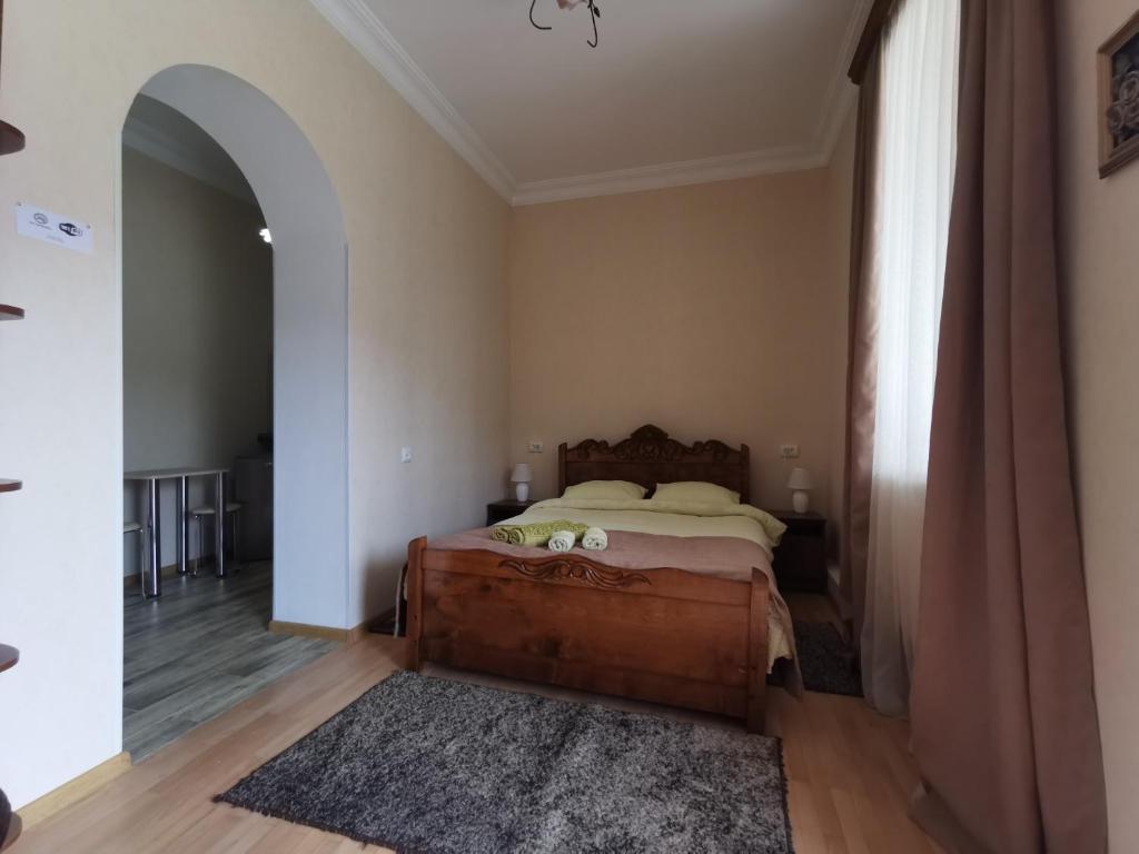 Llit o llits en una habitació de Grimis Villa
