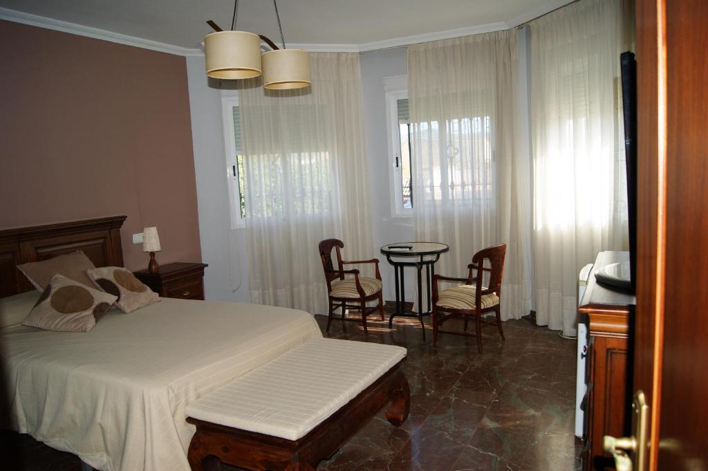 A bed or beds in a room at Villa Coco