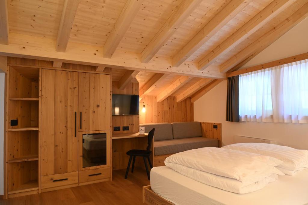 Postel nebo postele na pokoji v ubytování B&B Fontanella