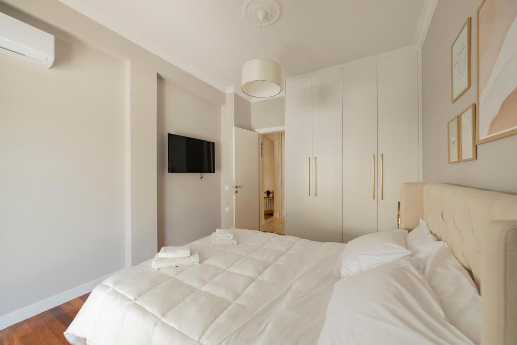 Posteľ alebo postele v izbe v ubytovaní HoneyBee Apartment