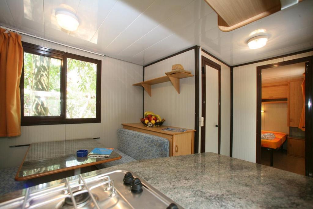 Kuchyň nebo kuchyňský kout v ubytování Camping La Gemma