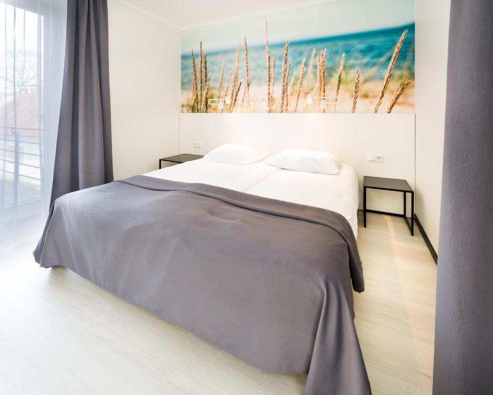 Postel nebo postele na pokoji v ubytování Hotel NOSPA