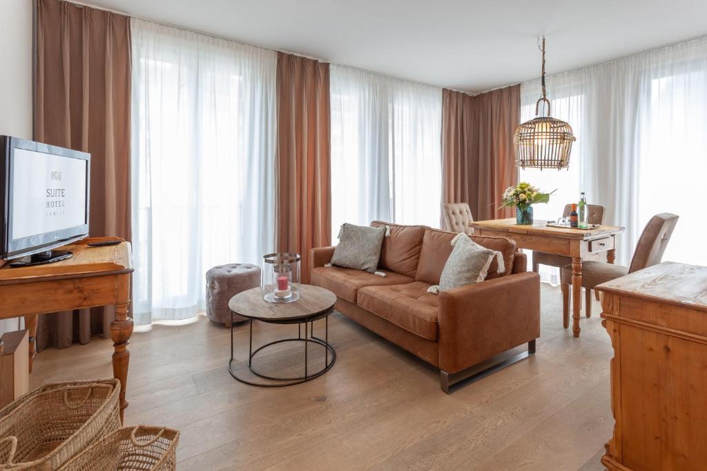 TV a/nebo společenská místnost v ubytování Suite Hotel Binz Familienhotel Rügen