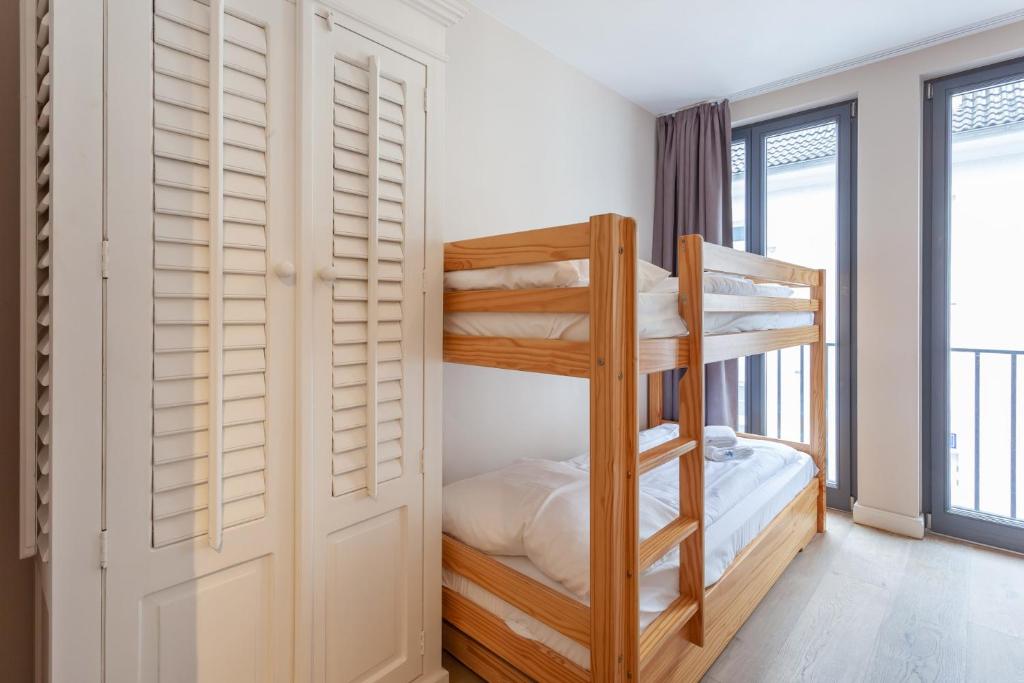 Postel nebo postele na pokoji v ubytování Suite Hotel Binz Familienhotel Rügen
