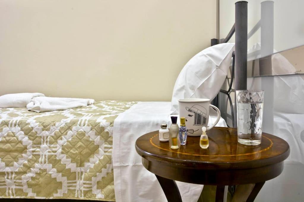 A bed or beds in a room at Sarantis Studio
