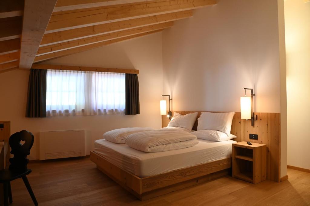 Postel nebo postele na pokoji v ubytování B&B Fontanella