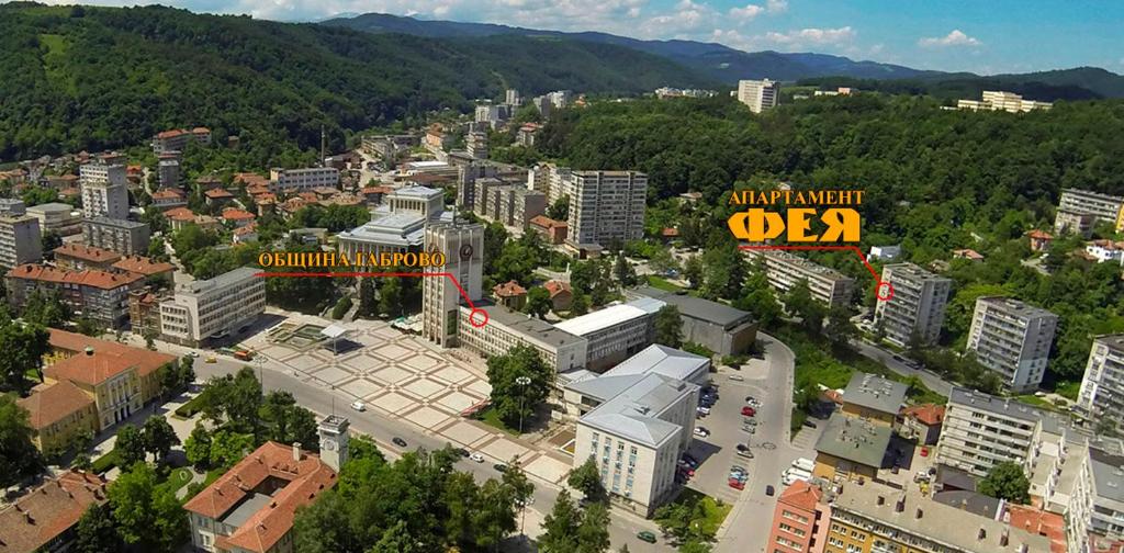 an aerial view of a city with buildings at Апартамент ФЕЯ - топ център, безплатно паркомясто in Gabrovo