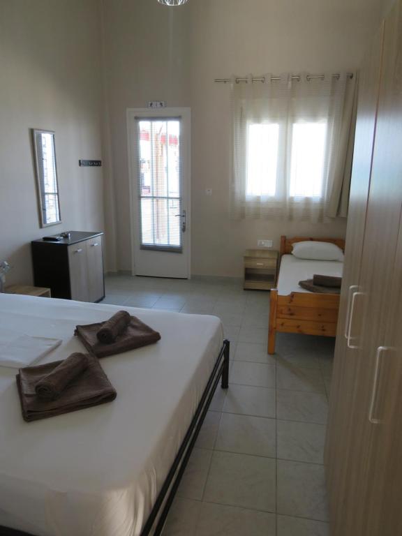 Postel nebo postele na pokoji v ubytování George rooms