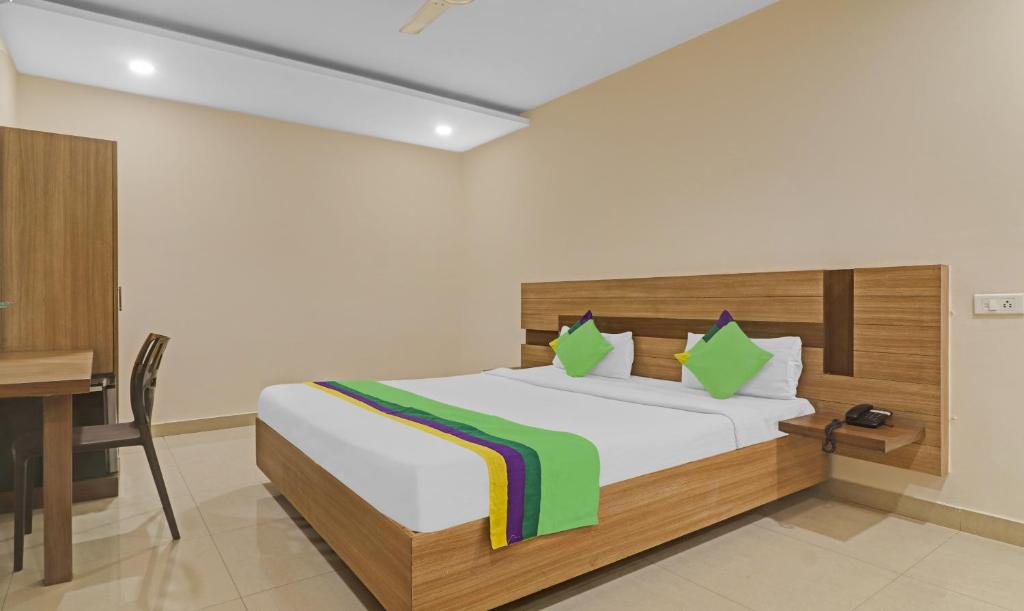 Postelja oz. postelje v sobi nastanitve Treebo Trend Pride Inn Botanica