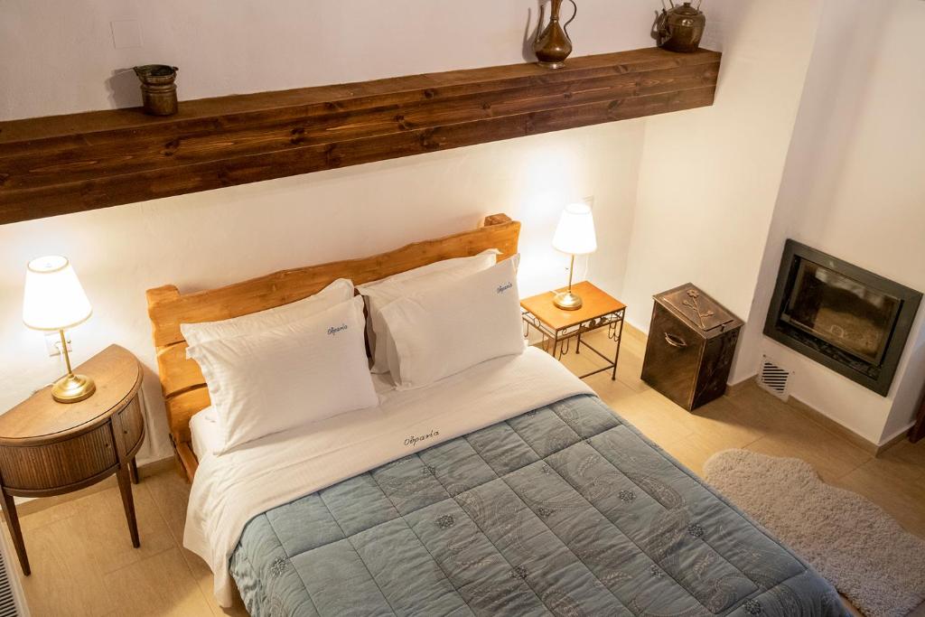 Postel nebo postele na pokoji v ubytování Guesthouse Ourania
