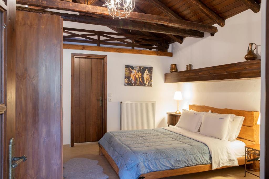 Postel nebo postele na pokoji v ubytování Guesthouse Ourania