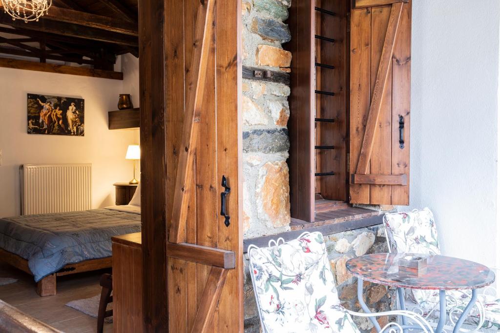 Postel nebo postele na pokoji v ubytování Guesthouse Ourania