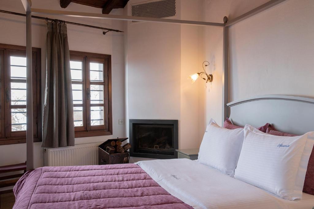 Postel nebo postele na pokoji v ubytování Guesthouse Ourania