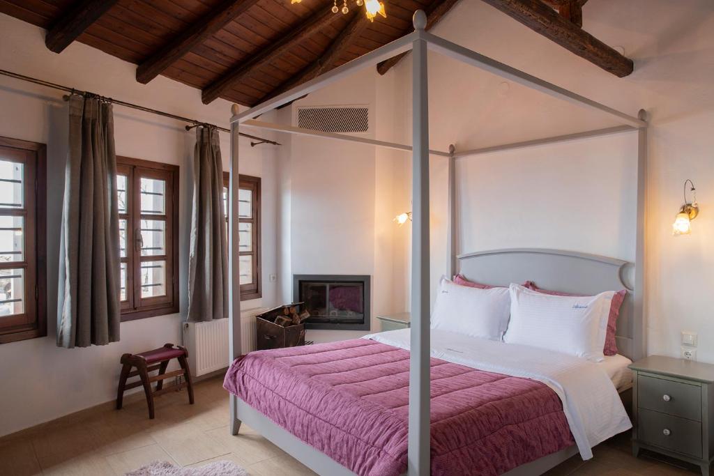 Postel nebo postele na pokoji v ubytování Guesthouse Ourania