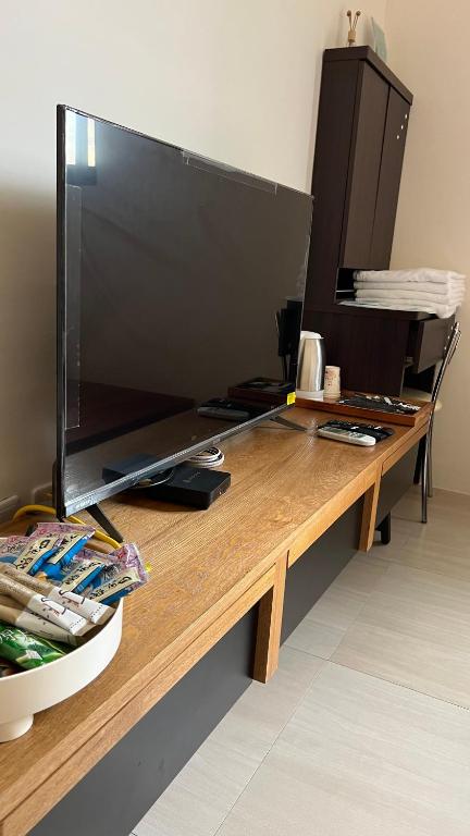 TV a/nebo společenská místnost v ubytování Dou Dou Long Homestay