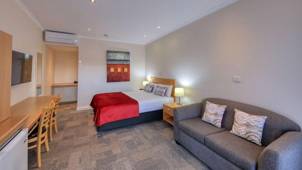 Postel nebo postele na pokoji v ubytování Quality Inn Swan Hill