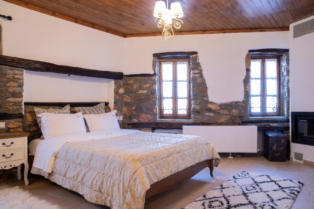 Postel nebo postele na pokoji v ubytování Guesthouse Ourania