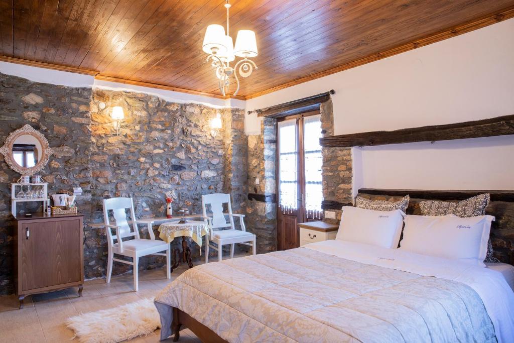 Postel nebo postele na pokoji v ubytování Guesthouse Ourania