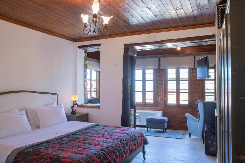 Postel nebo postele na pokoji v ubytování Guesthouse Ourania