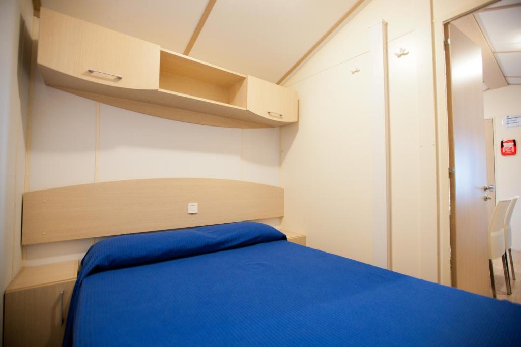 Postel nebo postele na pokoji v ubytování Camping Blu Fantasy