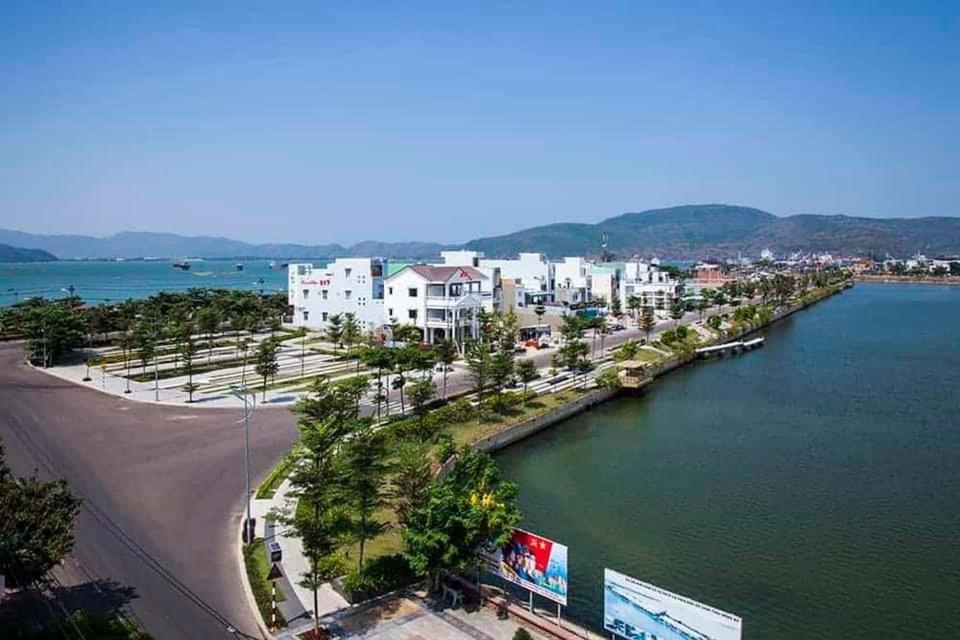 a view of a river with buildings and a city at HOSTEL ARIA in Quy Nhon