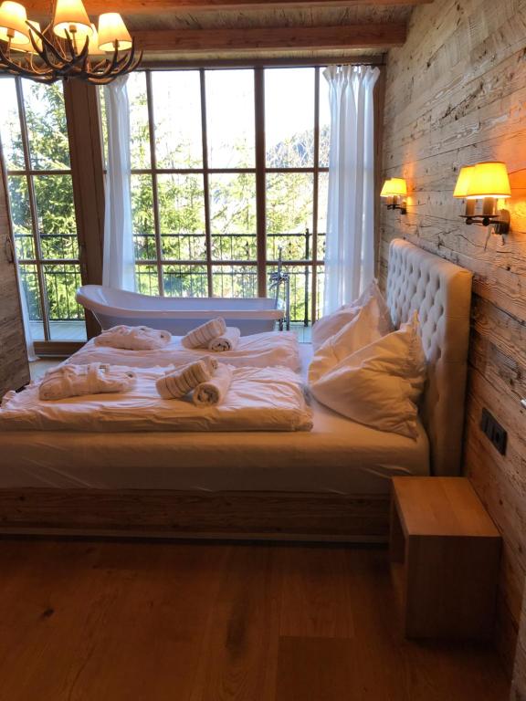 Posteľ alebo postele v izbe v ubytovaní Das Kitz - deLuxe ChaletApartments