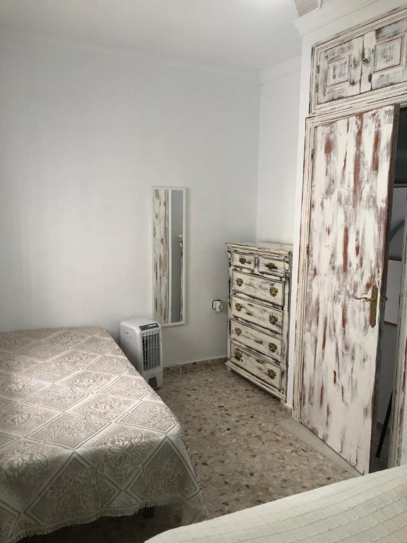 Postel nebo postele na pokoji v ubytování apartamento el levante