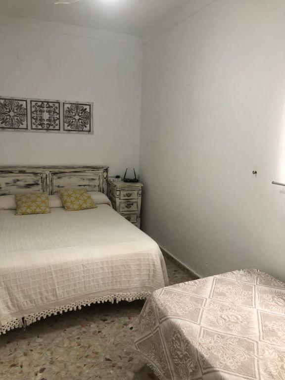 Postel nebo postele na pokoji v ubytování apartamento el levante