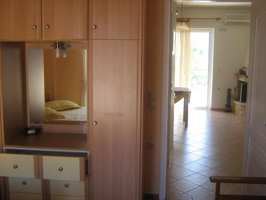 Postel nebo postele na pokoji v ubytování Filoxenia