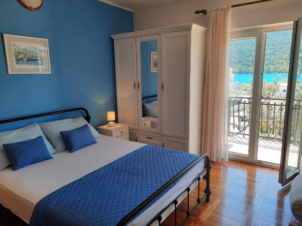 Postel nebo postele na pokoji v ubytování Apartments Dalmatia